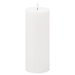 White cylindrical flameless LED candle with vertical ribbing texture, shown front-on.