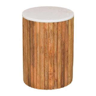 Cylindrical side table with a smooth white marble top and a drum base made of vertically fluted natural wood.