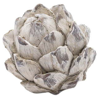 Detailed view of the white and brown distressed finish on the decorative artichoke sculpture.
