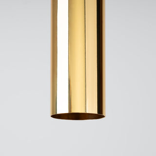 Polished gold cylindrical light fitting, showing the reflective surface and open base.
