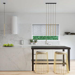 Single gold pendant over kitchen counter and five-light cluster over island table.