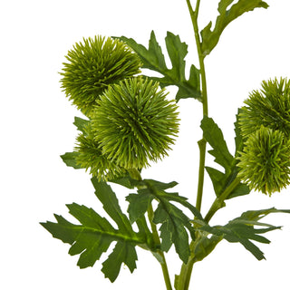 Close up of the artificial stem showing the bright green spiky thistle heads and serrated leaves.