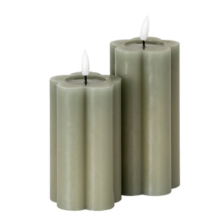 Two fluted grey LED candles, one taller than the other, with lit faux flames.