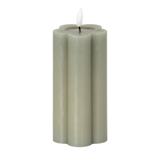 Plain front view of the grey fluted LED pillar candle with a faux flickering flame effect.