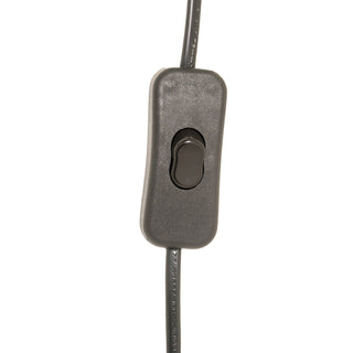 Close-up of the dark grey inline rocker switch on the power cable.