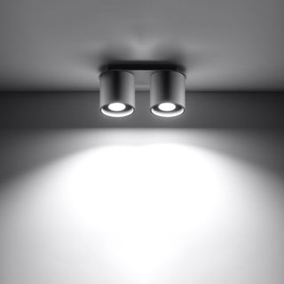 Grey twin ceiling lamp switched on, highlighting the strong downward light beam.