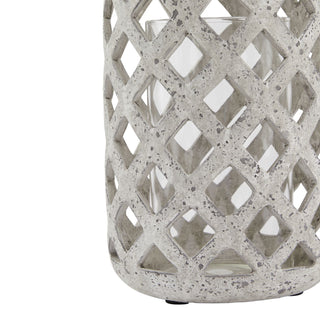 Close-up of the hurricane base, showing the distressed grey stone texture and diamond lattice cut-outs.