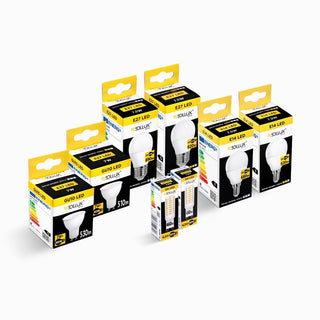 Studio shot of a complete range of LED bulbs and their packaging boxes on a white background.