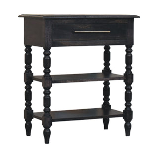 Plain front-on studio shot of the dark wood side table with turned legs and two storage shelves.