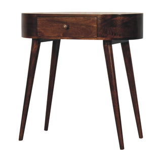 Angled view of the small console table showing the rounded body and tapered mid-century legs.