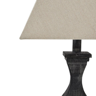 Detail of the Incia lamp base showing the grey-washed wood grain and the natural fabric shade texture.