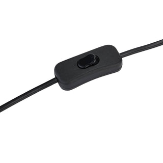 Close-up of the black plastic rocker switch located on the lamp's power cable.