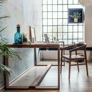 wooden desk in bohemian style room