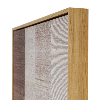 Angled view showing the light wood frame corner and the textured canvas artwork.