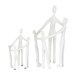 White stylised family ornaments in groups of three and four figures shown together.