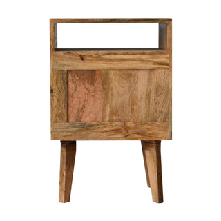 Front-on view of the wooden bedside cabinet highlighting the strong grain and varied colour tones of the mango wood.