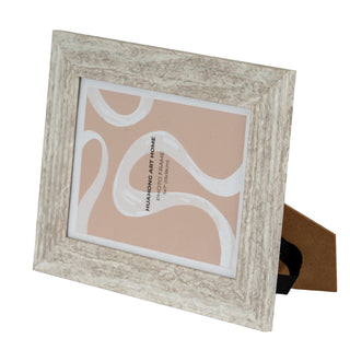 Distressed light grey frame shown at an angle, revealing the texture and easel stand.