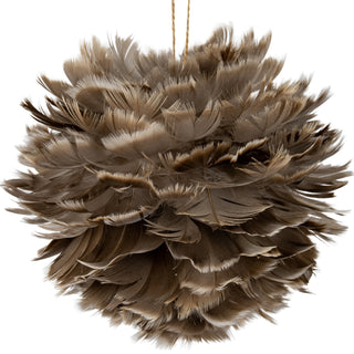 Close detail shot showing the layered, fluffy texture of the individual fawn feathers.