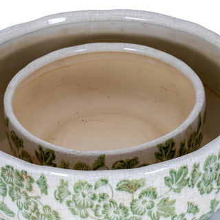 Extreme close up of the bowl's interior, showing the cream crackle glaze and surface texture.