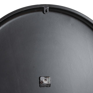 Back view of the large grey wall clock showing the hanging hook and movement mechanism.
