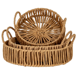 Two nested round trays made from woven natural paper rope with loop handles.