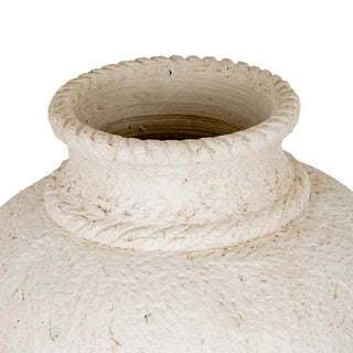 Close detail of the vase neck, textured surface, and braided rope rim.