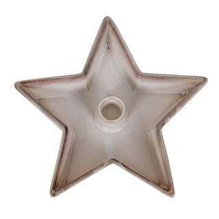 Top-down view of the empty ceramic star candle holder showing the central socket and rustic brown rim.