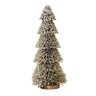 Plain front-on view of the tiered brush tree decoration covered in white flocking, standing on a round wooden base.
