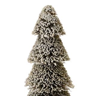 Close detail of the top tiers of the snowy brush tree, highlighting the texture of the white flocking.