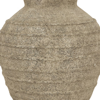Detail shot of the vase's rough, grey body texture and pronounced horizontal ridges.