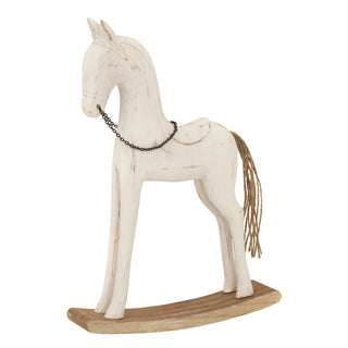 Full side view of the whitewashed wooden rocking horse sculpture on its curved natural wood base.