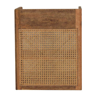 Close-up showing the tight weave of the cane webbing panel framed by the dark mango wood.