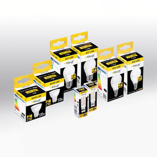 Angled view of multiple sizes and types of LED bulb packaging boxes arranged in a group.
