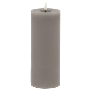Tall cylindrical grey wax flameless pillar candle shown front-on against a white background.