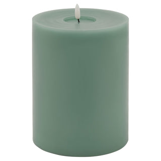 Sage wax LED pillar candle in sage green with a melt effect top and white faux flame, on a plain background.