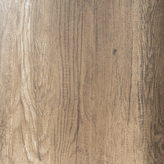 Detailed view of the bookcase's light brown wood-effect finish, highlighting the vertical grain pattern.