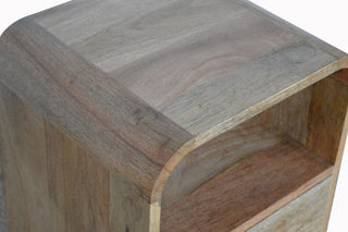 Detail shot of the bedside table top surface and open shelf highlighting the varied wood grain colouration.