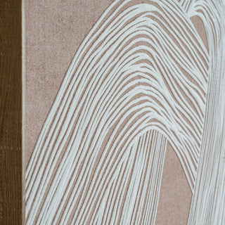 Extreme close-up showing the raised white textured lines forming wavy patterns on the beige woven canvas.