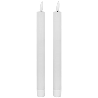Plain front-on view of two white LED dinner candles with textured bodies and faux flames.