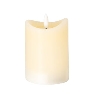 Cream coloured LED pillar candle with a melted top edge and white plastic flame, shown front-on against a white background.