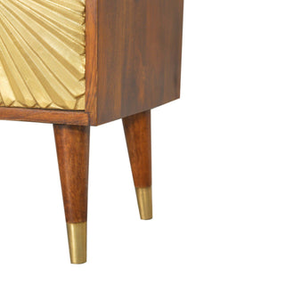 Close-up of the dark wood tapered legs with brass ferrules supporting the cabinet frame.