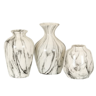 The large marble vase shown alongside two other smaller vases in the same black and white finish.