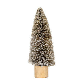 Medium cone-shaped bottle brush tree decoration, frosted white over brown bristles, standing on a light wooden base.