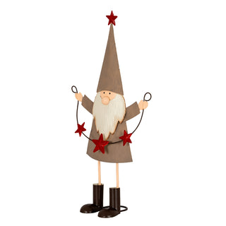 Full length shot of the metal elf figure with thin legs and brown boots.