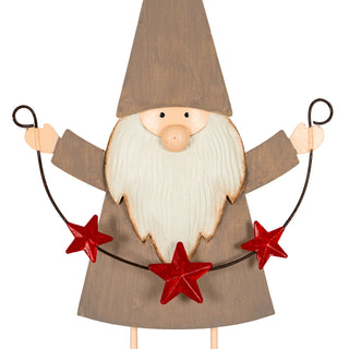 Detail shot of the metal elf's face, painted beard, and the red star garland held in its hands.