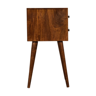 Side profile of the chestnut bedside table showing the depth and tapered legs.