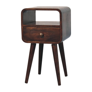 Dark walnut curved bedside table featuring an open slot, drawer, and round metal knob.