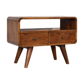 Three-quarter view of the chestnut media unit highlighting the curved edges and tapered wooden legs.