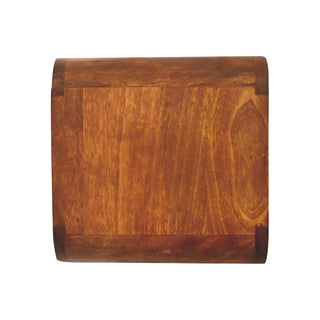 Top-down view of the dark wood bedside unit, highlighting the curved edges and panel construction.