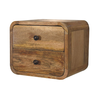 Close-up showing the natural wood grain and rounded corners of the two-drawer floating bedside cabinet.